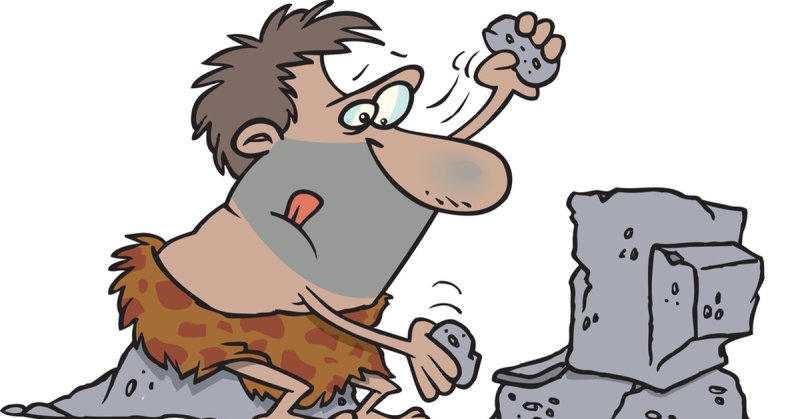 Доисторический человек с камнем