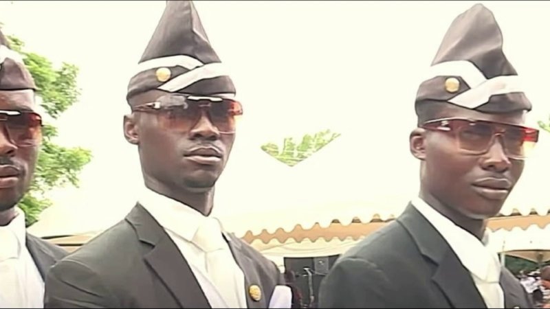 Негры с гробом