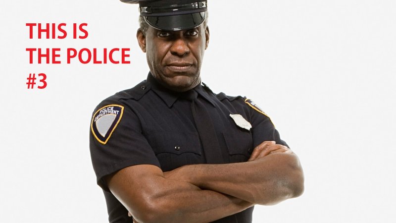 Афроамериканец полицейский