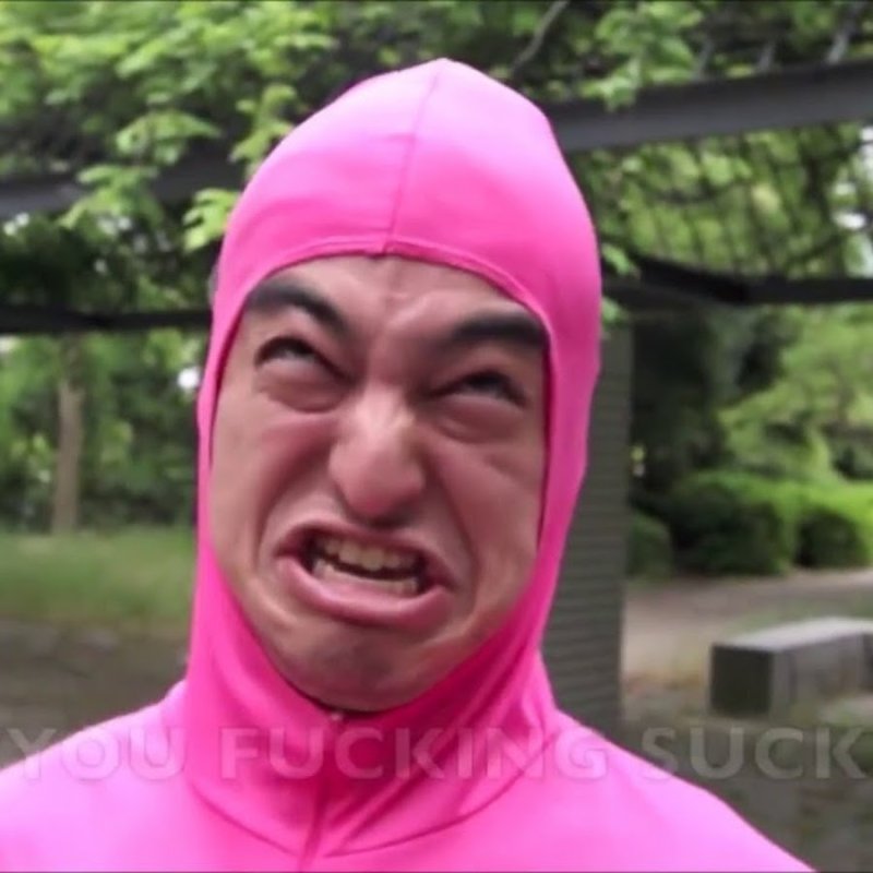 Человек в розовом костюме