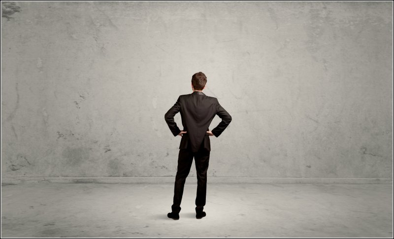 A person standing with his back