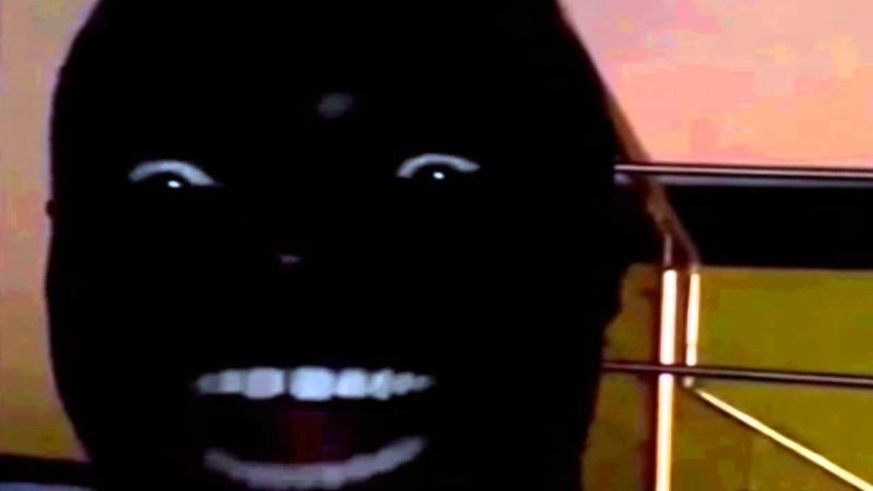 Негр в темноте