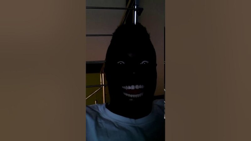 Негр в темноте