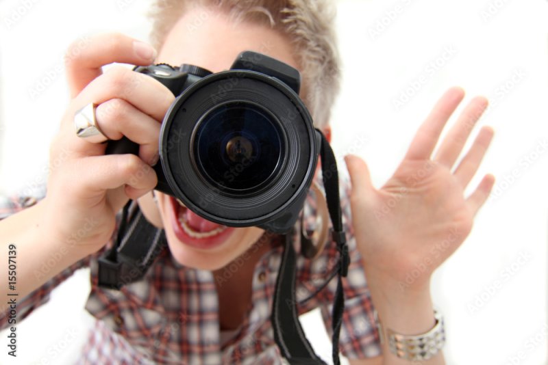 Подросток с фотоаппаратом