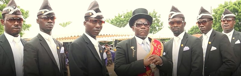 Негры с гробом