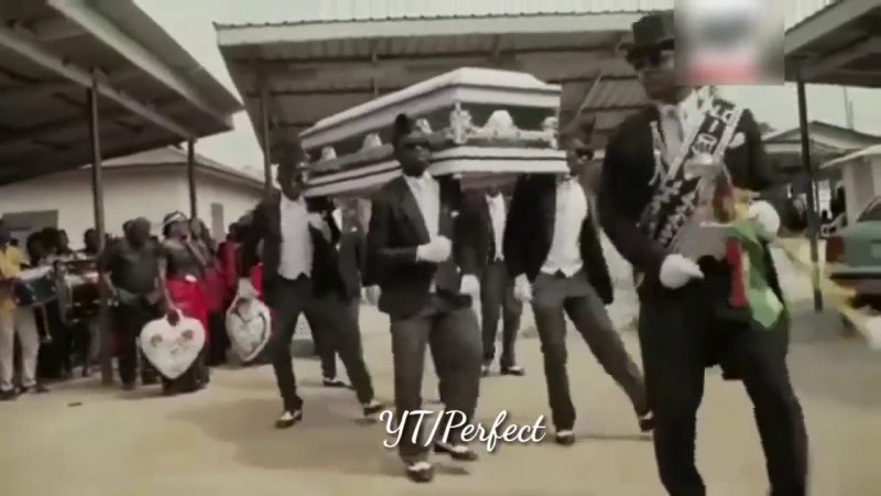 Афроамериканцы танцуют с гробом