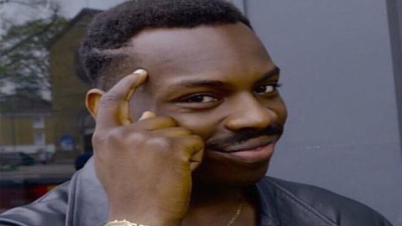 Нигер с пальцем у Виска