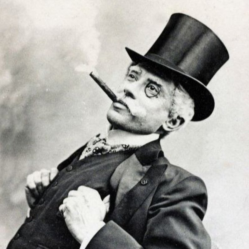 Человек в цилиндре и с моноклем
