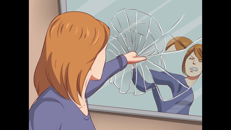 Человек тычет в зеркало