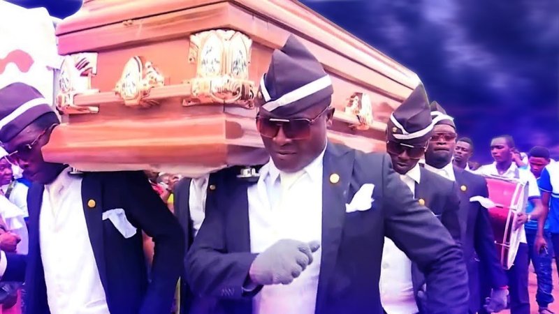 Негры с гробом