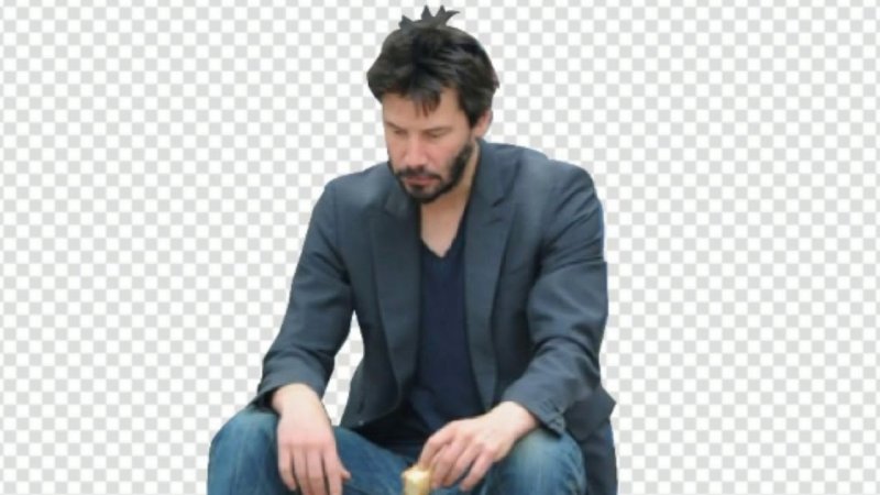 Киану Ривз сидит грустный