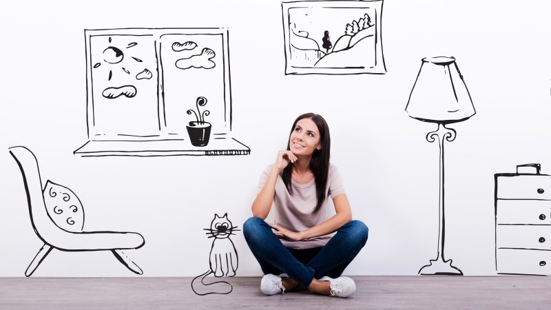 Девушка размышляет в квартире