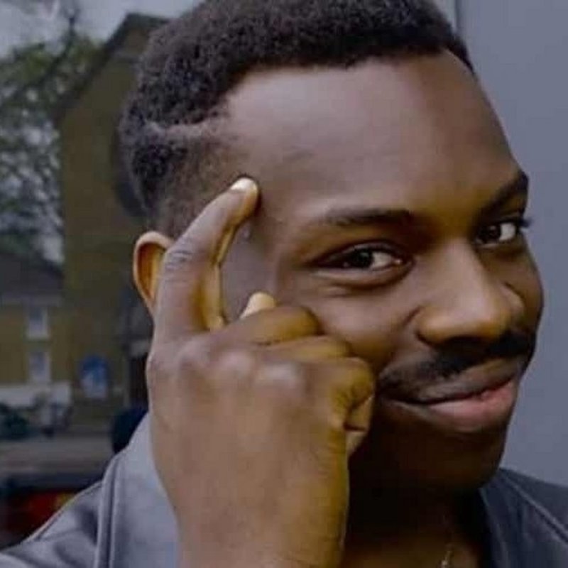 Негр прикладывает палец