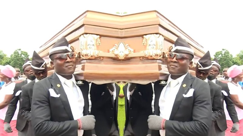 Негры с гробом