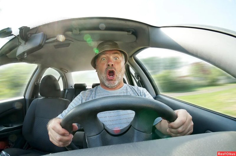 С мужиком за рулем