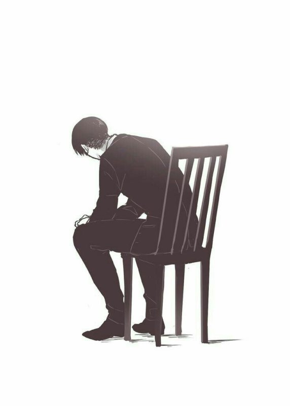 Человек сидит на стуле