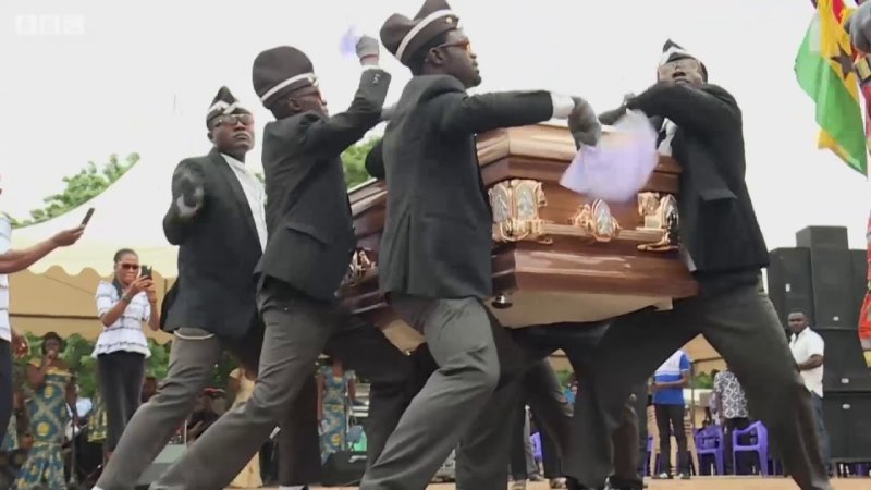 Негры с гробом