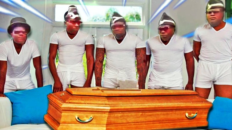 Негры с гробом