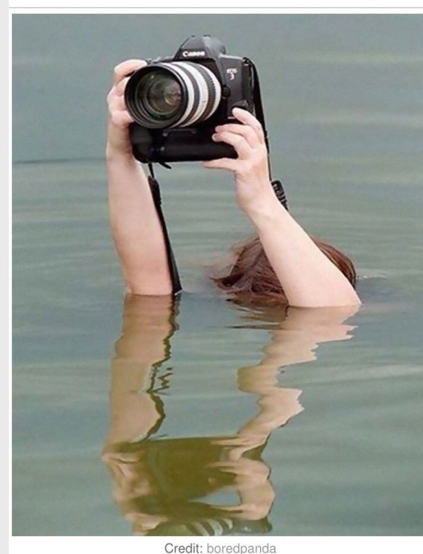 Фотоаппарат в руках