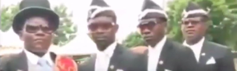 Афроамериканцы танцуют с гробом