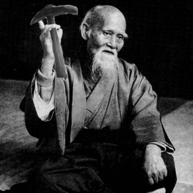 Морихей Уэсиба с пальцем